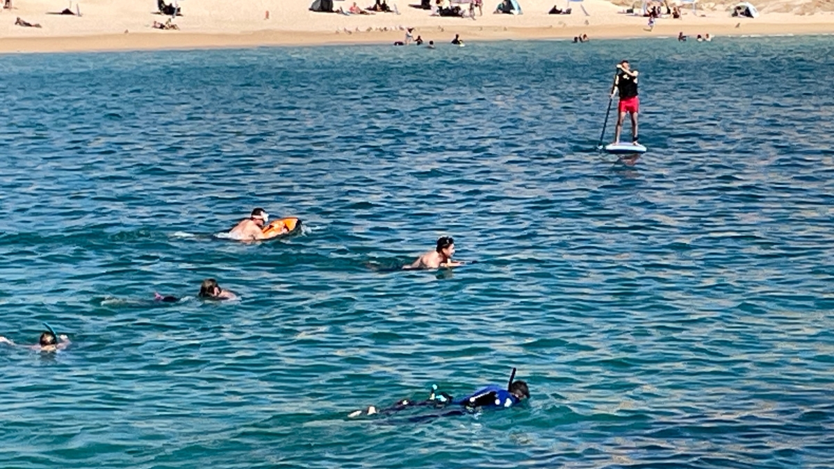 Snorkelers at Santa Maria Bay