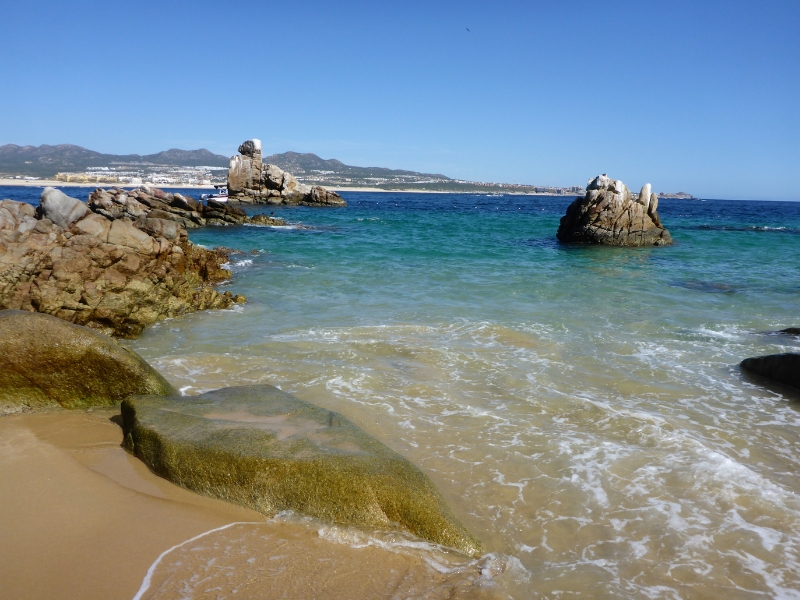 The serene Lover's Beach, a short distance from Pelican Rock.