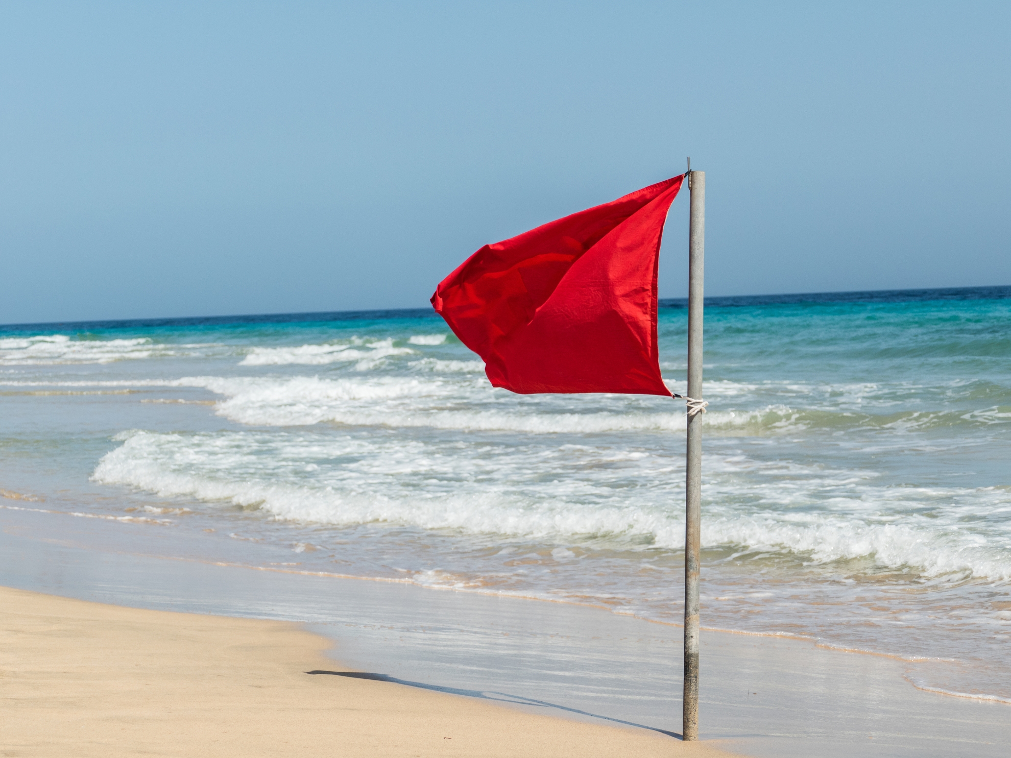 Red flag. Dangerous to swim conditions in Los Cabos