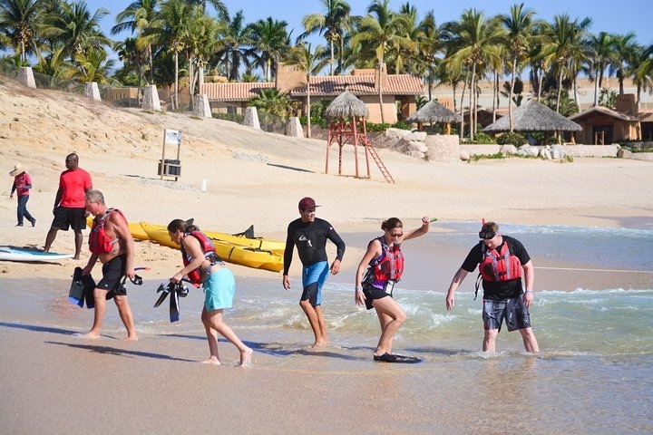 Going to snorkel from the beach at Chileno Bay