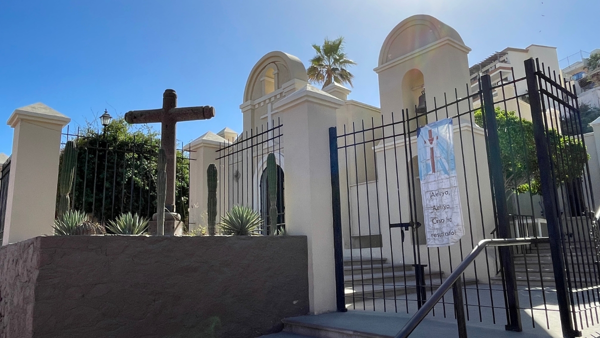 Cabo San Lucas Church illuminated at morning sun, symbolizing its enduring presence in the community.