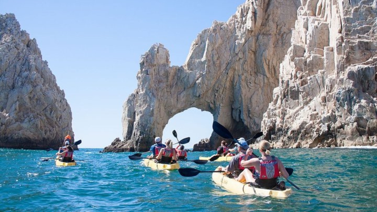 Kayakers visiting the Arch in Cabo Bay