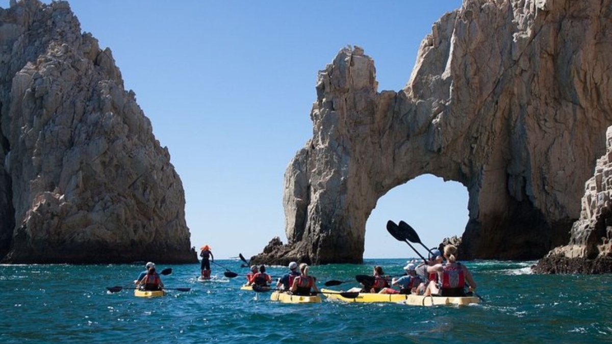 Kayakers arriving to Cabo Arch